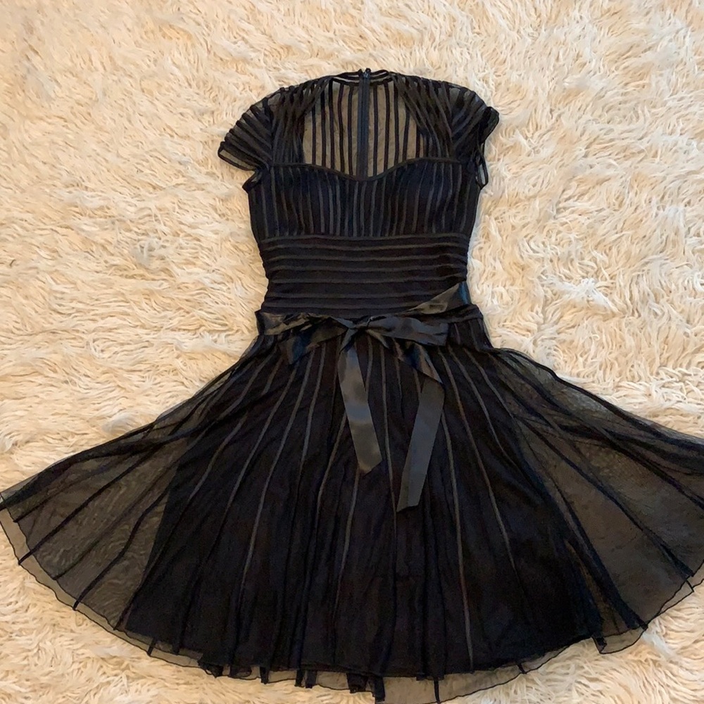 Flattering black cocktail dress size 8